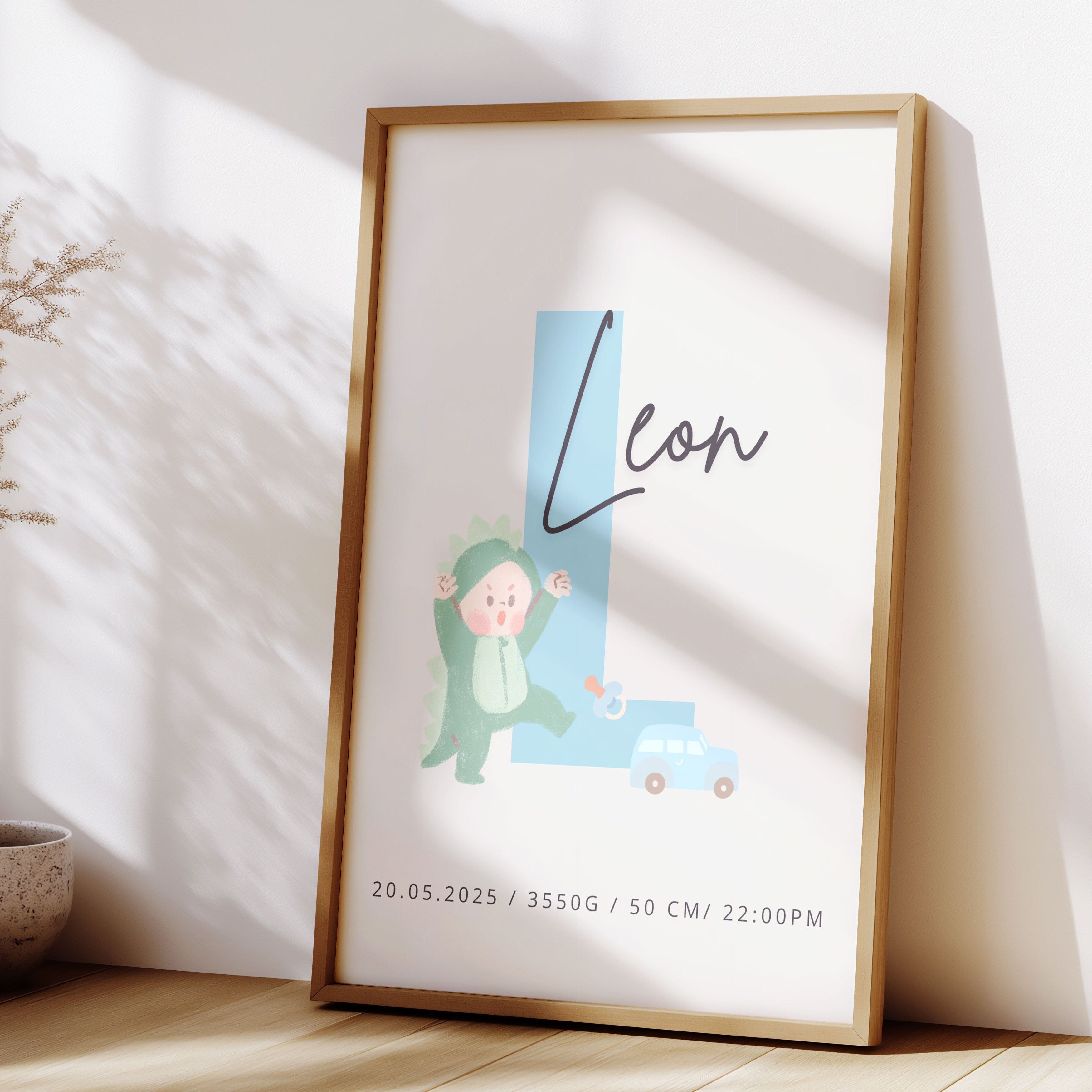 Framed artwork with a child illustration and text, placed on a wooden surface with a vase and plants.
